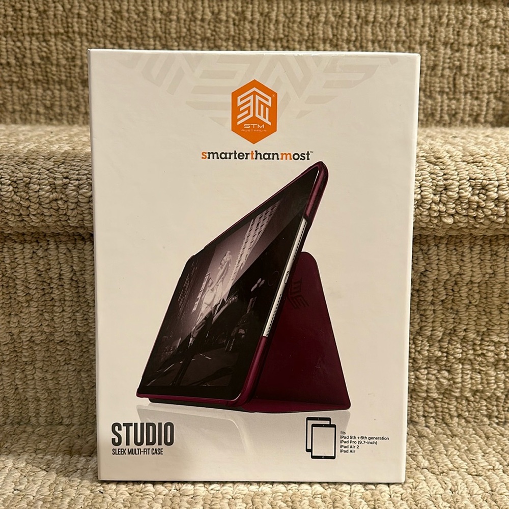 New in box IPad purple case